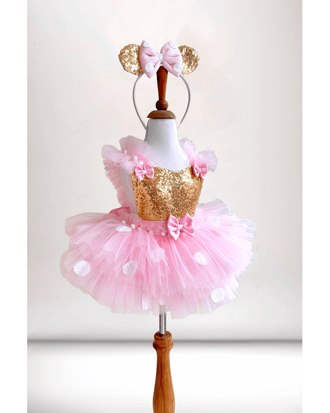 Pink & Gold Minnie Mouse Inspired Costume by Costumes Club. SKUs: 66105934418218, 66218366886179, 66373204512676, 66484035483154, 66585426017221, 66620795753257, 66791939354167, 66889370563377, 66957722730763, 67051710307012